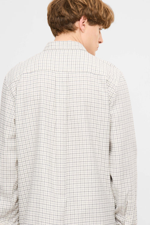 Rodrik white check